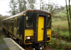 A train pulls into Causeland Station.