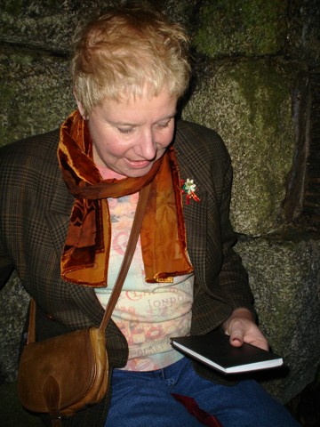 Francis Prestige, voice actor, about to write in the visitors book.
