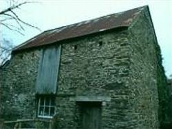 A rusted roof and crumbling walls.